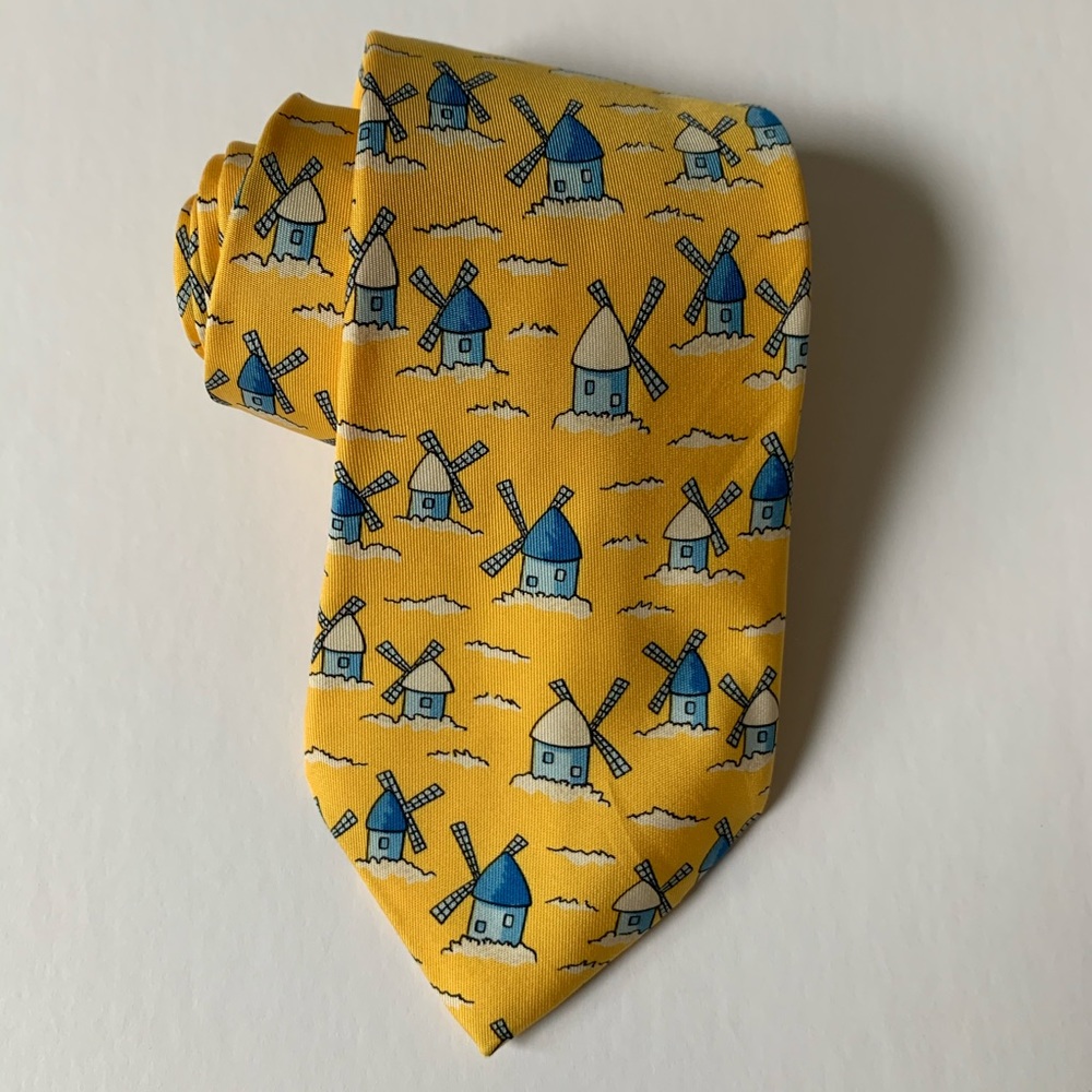 Authentic like new silk Hermes tie in yellow and white lighthouse print
